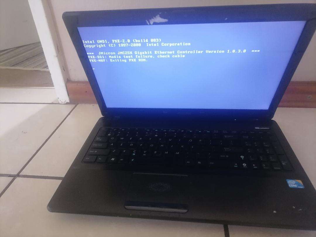 YEAR END CLEARANCE SALE*ASUS K52F I3 LAPTOP*4GB RAM, 1TB HDD*POWERS ON AND OFF*SOLD AS IS*