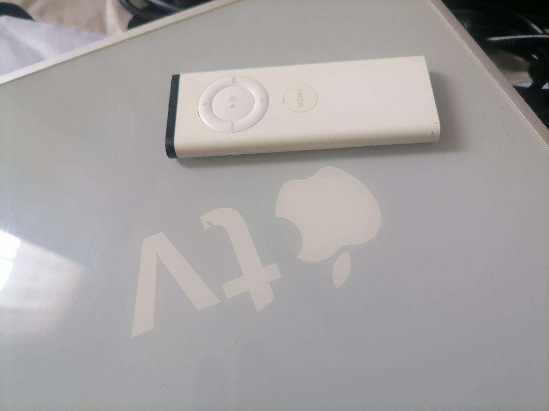 Apple A1218 TV Streaming Box with Remote and Cables in Box