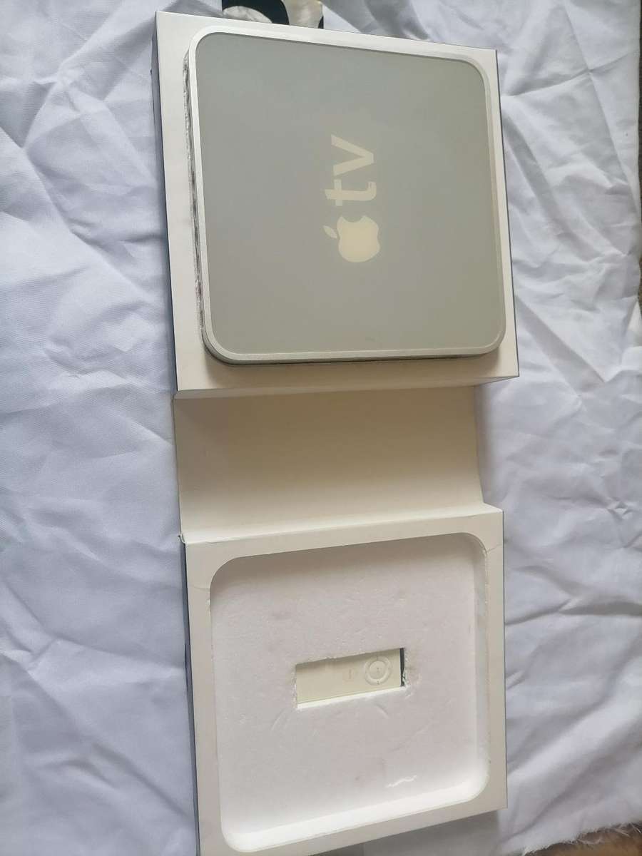 Apple A1218 TV Streaming Box with Remote and Cables in Box