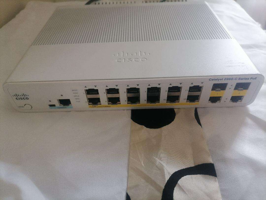 Cisco Catalyst PoE Network Switch. PN: WS-C2960C-12PC-L.