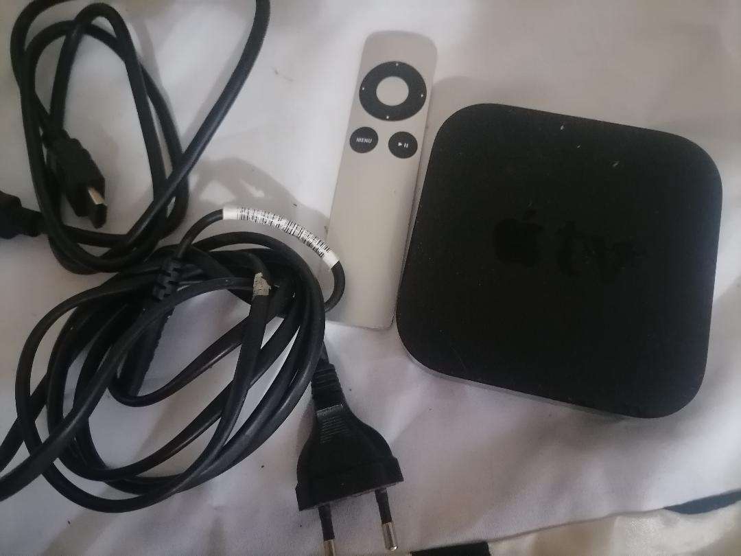 Apple A1469 TV Streaming Box with Remote and Cables