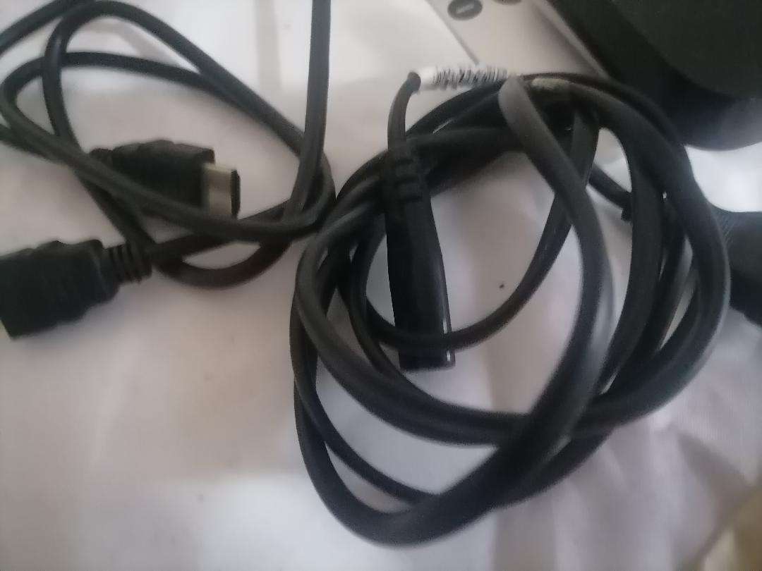 Apple A1469 TV Streaming Box with Remote and Cables