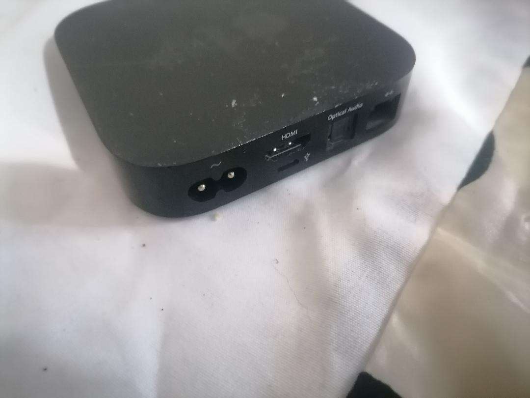 Apple A1469 TV Streaming Box with Remote and Cables