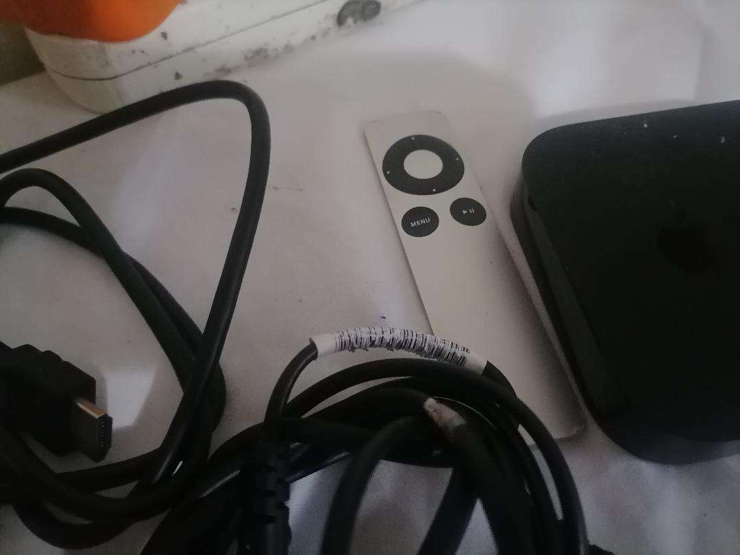 Apple A1469 TV Streaming Box with Remote and Cables
