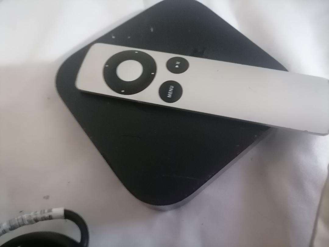 Apple A1469 TV Streaming Box with Remote and Cables