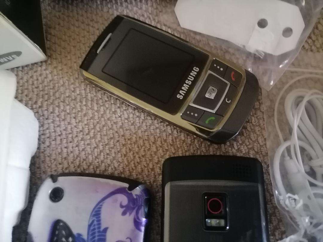 LOT OF UNTESTED CELLPHONES,CABLES,HEADSETS ETC*ONE BID FOR THE LOT