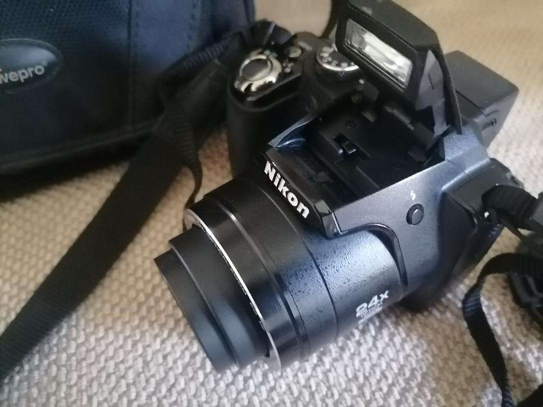 Nikon Coolpix P90 Camera with Tilt LCD Screen, Charger, 2 Batteries, in Bag