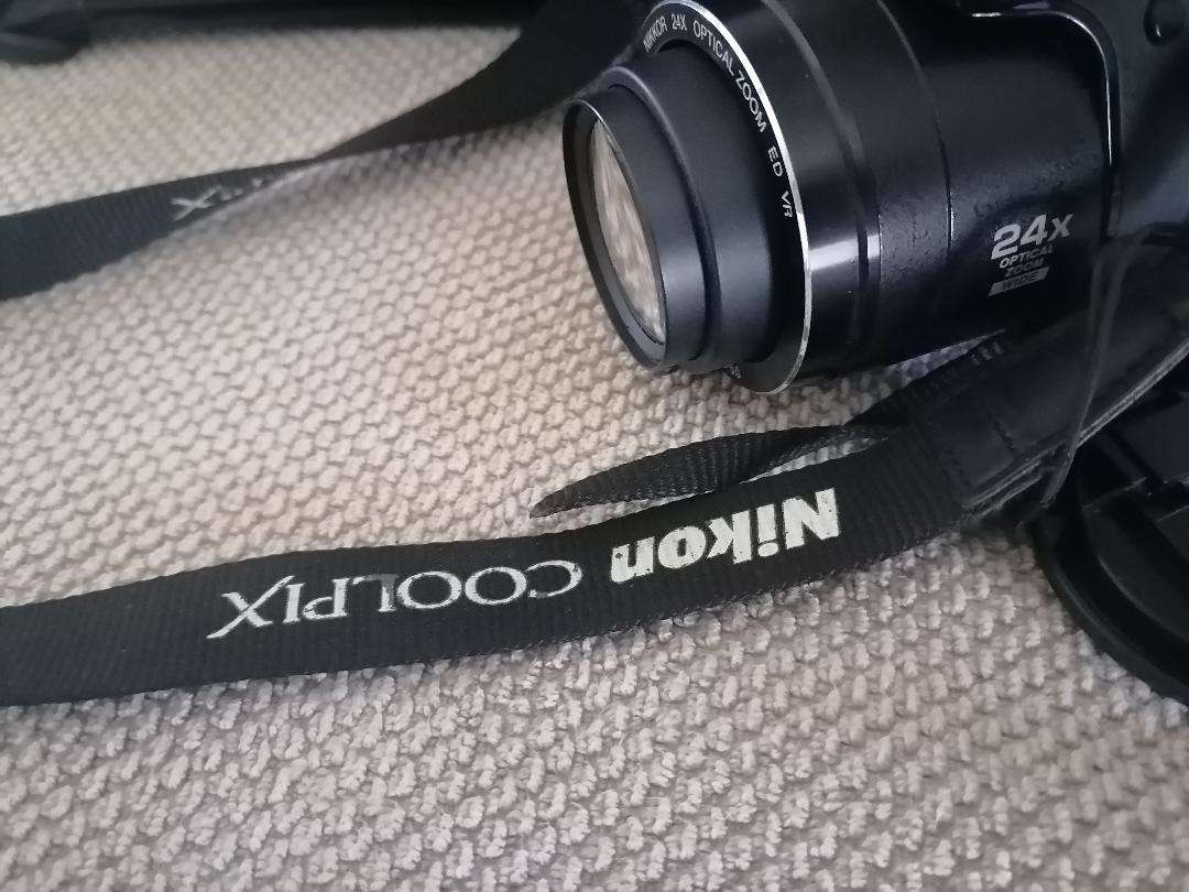 Nikon Coolpix P90 Camera with Tilt LCD Screen, Charger, 2 Batteries, in Bag