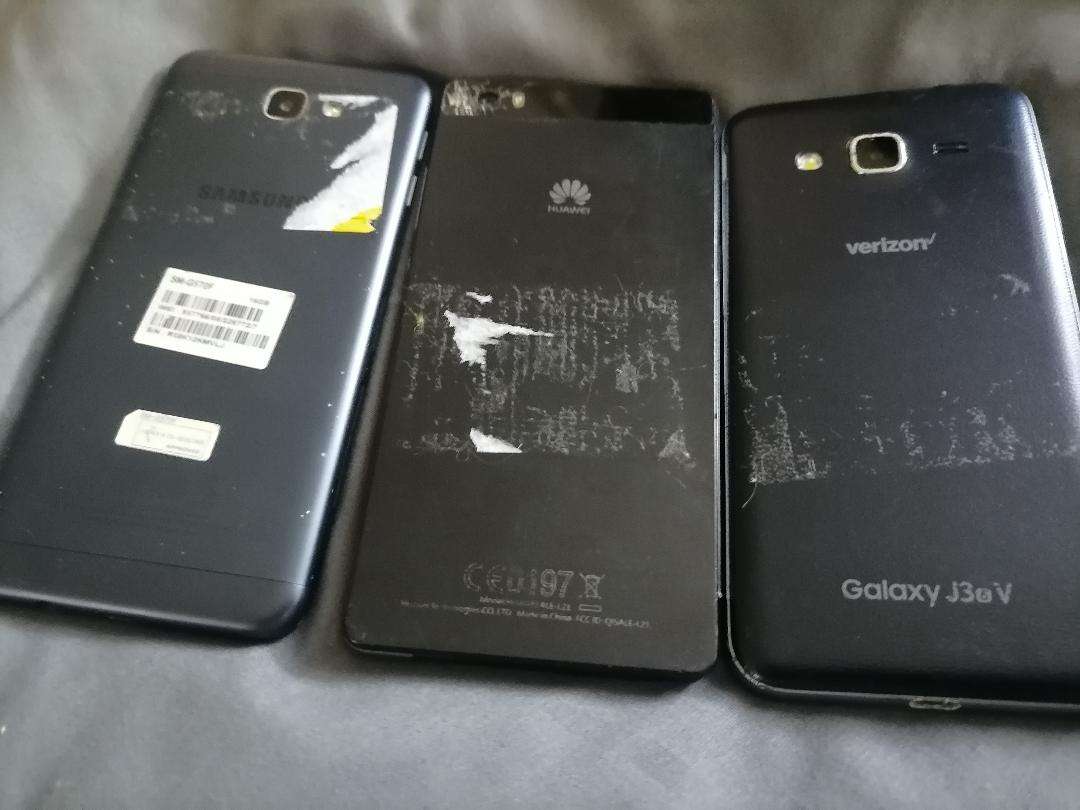 Lot of 3 x Defective Cellphones*one bid for the lot*untested*