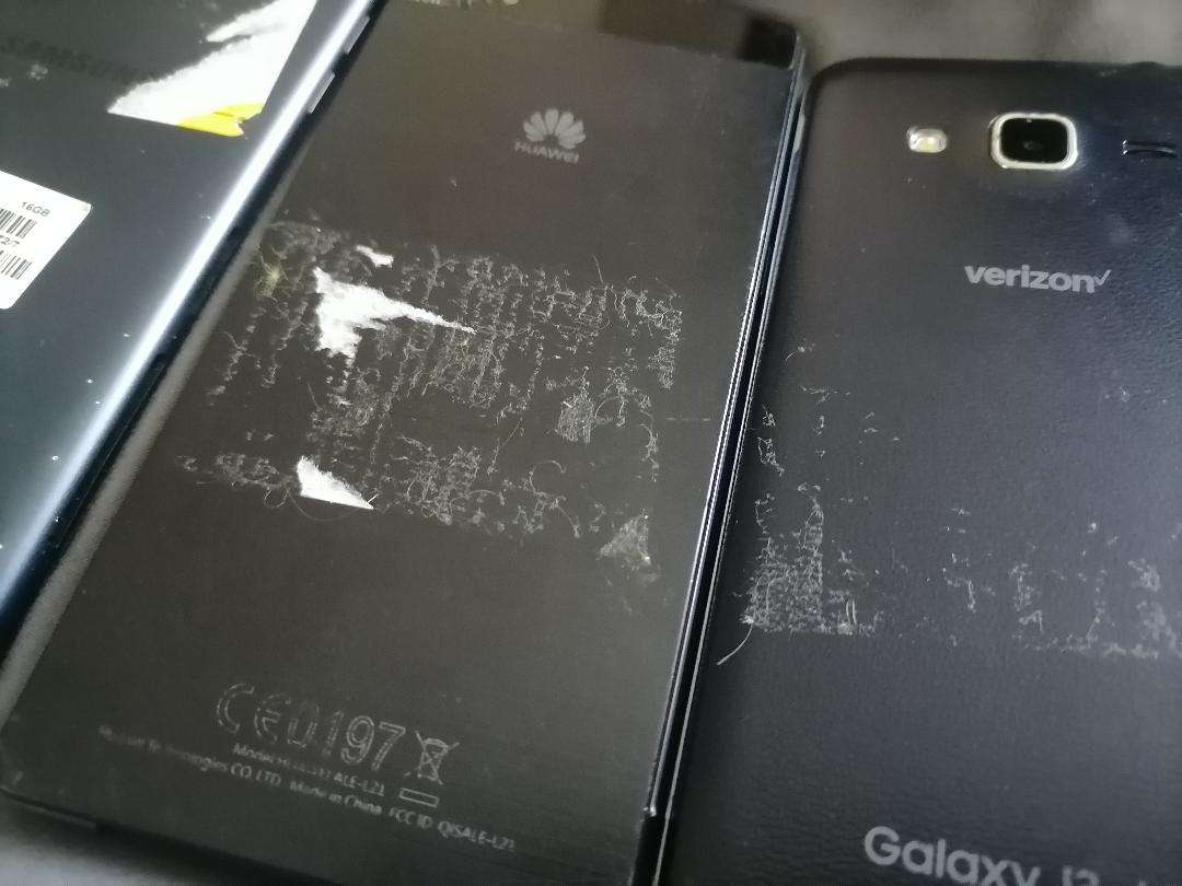 Lot of 3 x Defective Cellphones*one bid for the lot*untested*