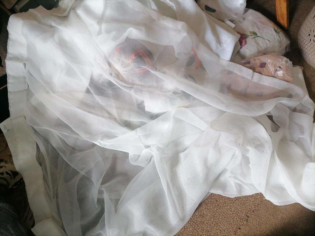 Bulk lot of pillow cases, curtains, etc. One bid for the lot.