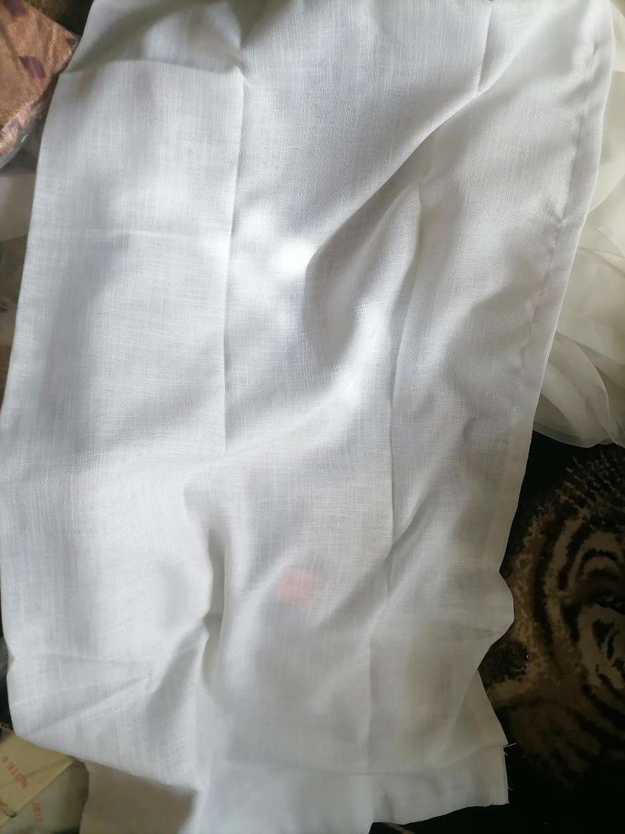 Bulk lot of pillow cases, curtains, etc. One bid for the lot.