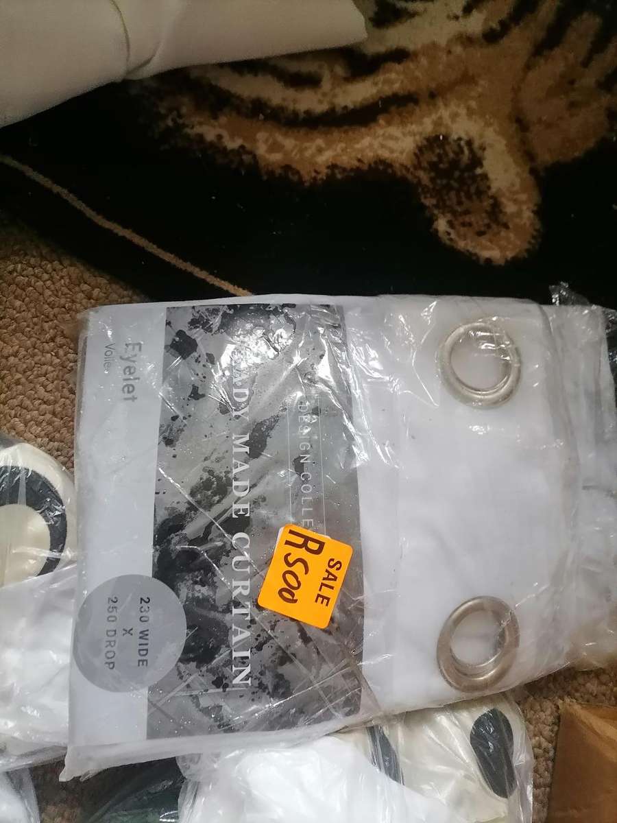 Bulk lot of pillow cases, curtains, etc. One bid for the lot.