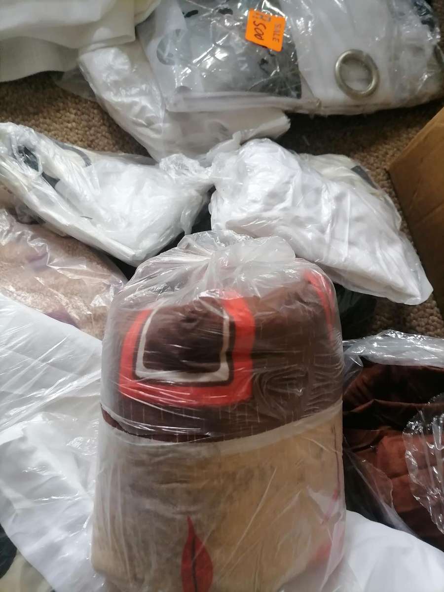 Bulk lot of pillow cases, curtains, etc. One bid for the lot.