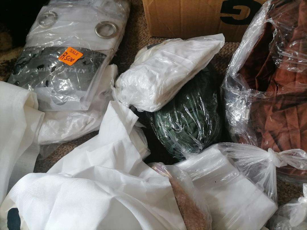 Bulk lot of pillow cases, curtains, etc. One bid for the lot.