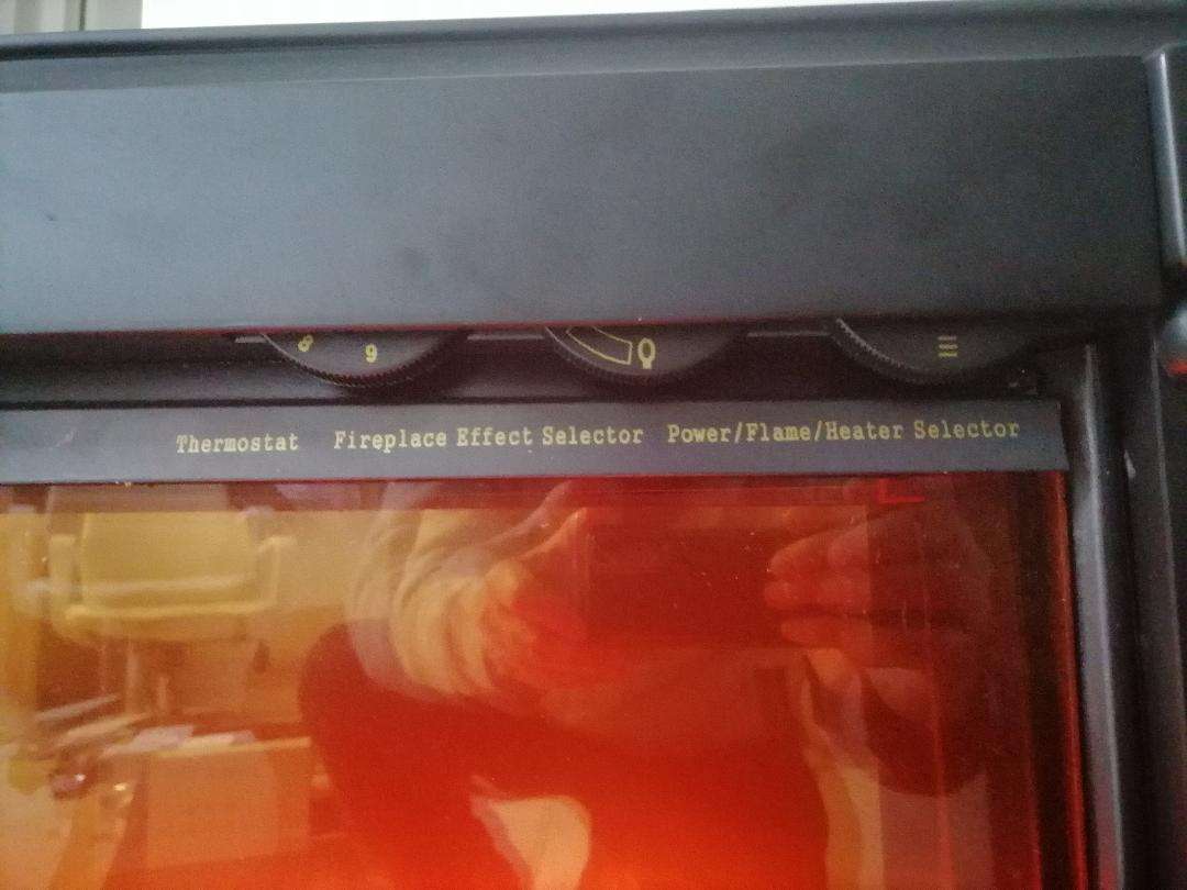 Hometrends Electric Fireplace Heater in box