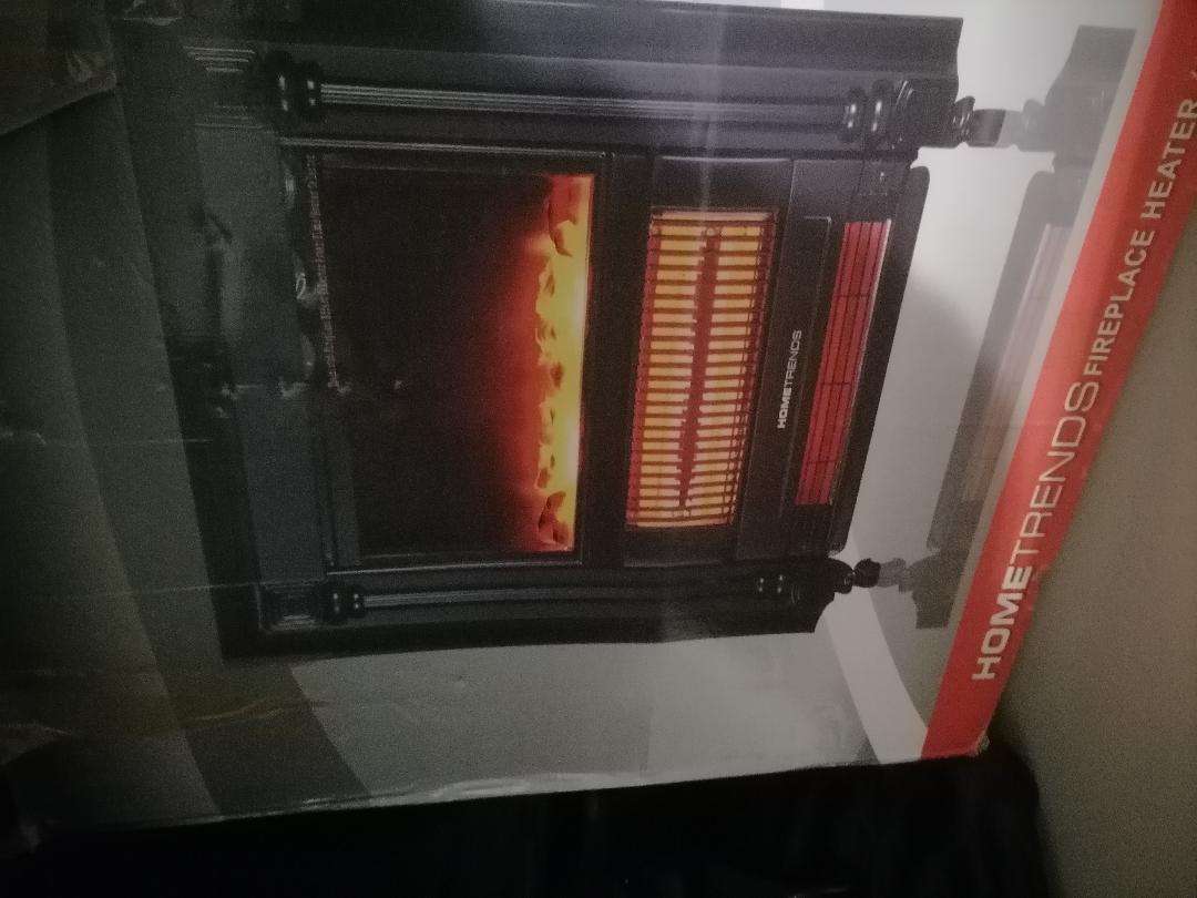 Hometrends Electric Fireplace Heater in box