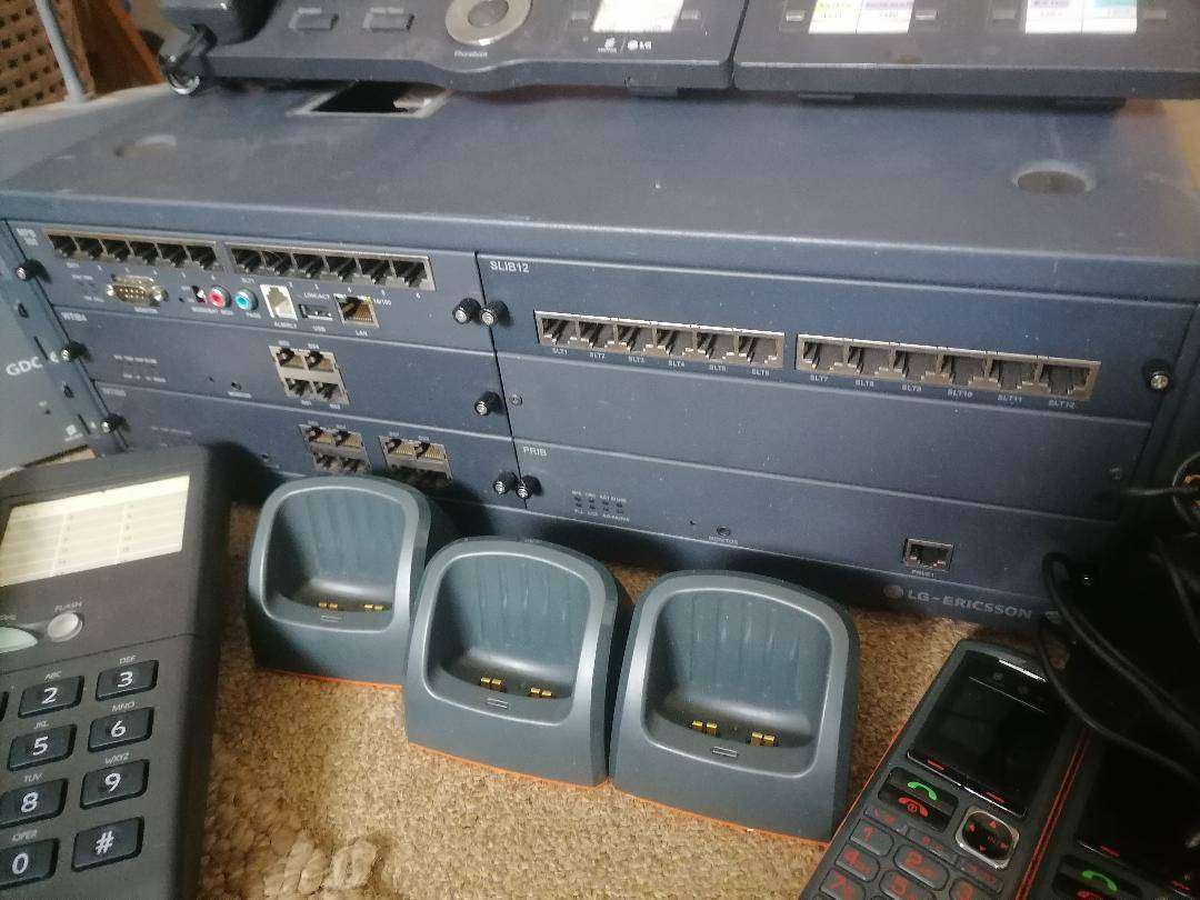 Communications system with switchboard,cordless phones,base stations etc*