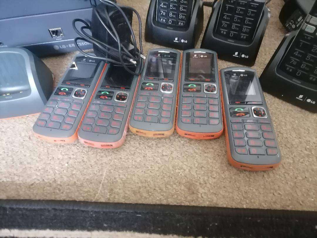 Communications system with switchboard,cordless phones,base stations etc*