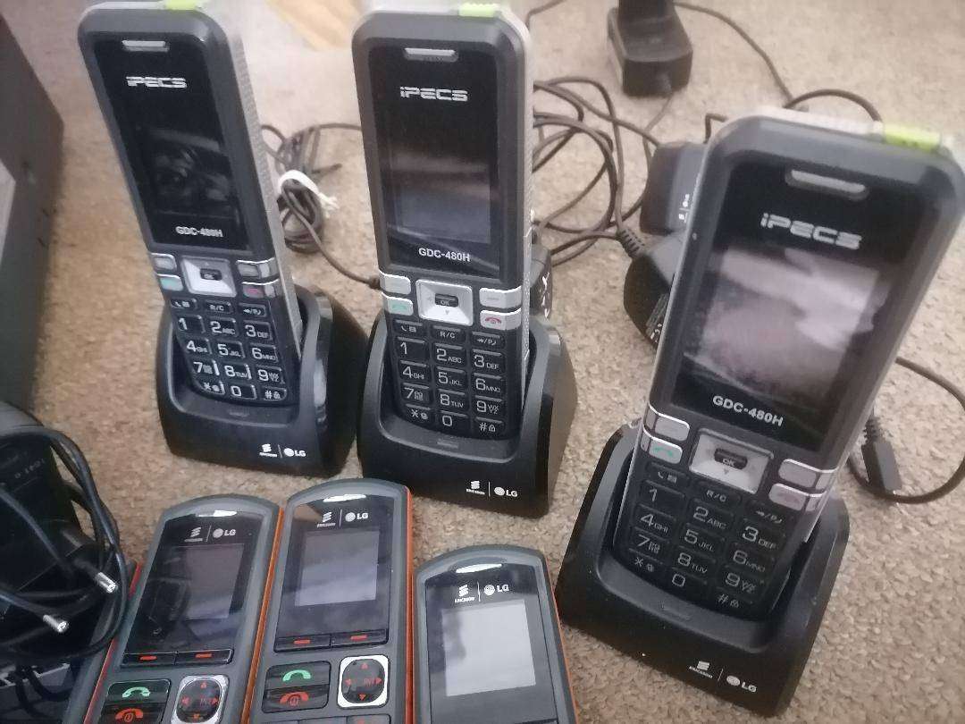 Communications system with switchboard,cordless phones,base stations etc*