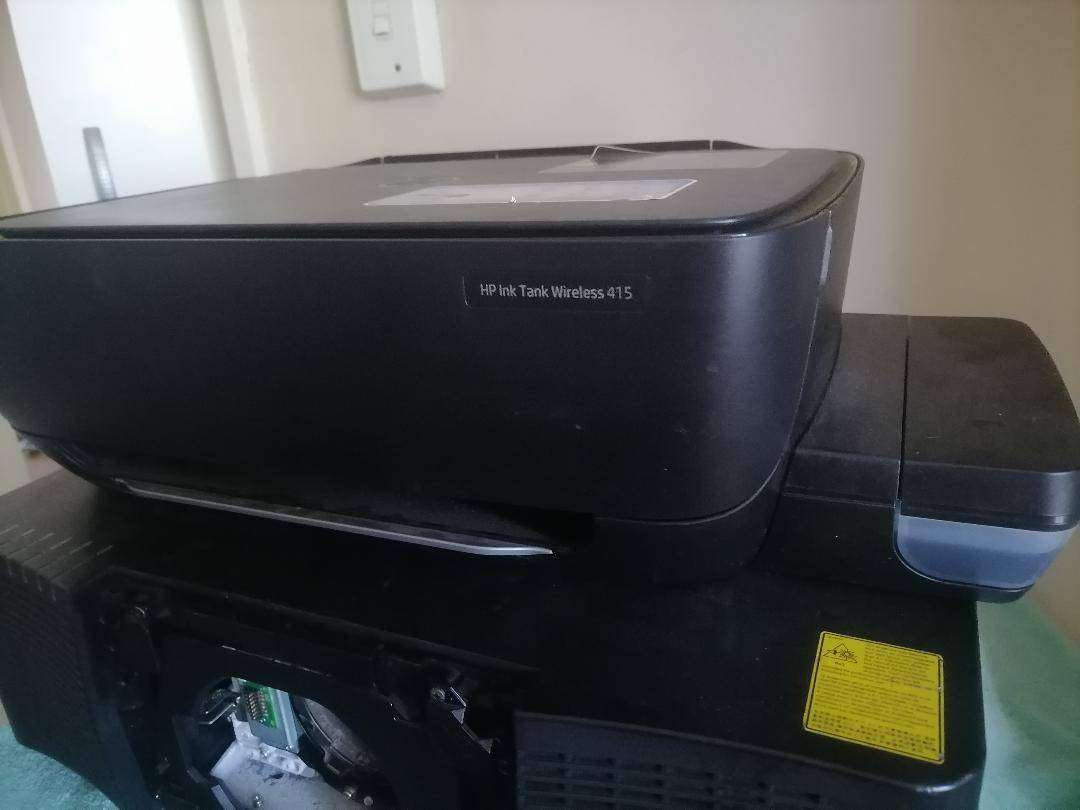 hp intank+christie projector(sold as is)one bid for both