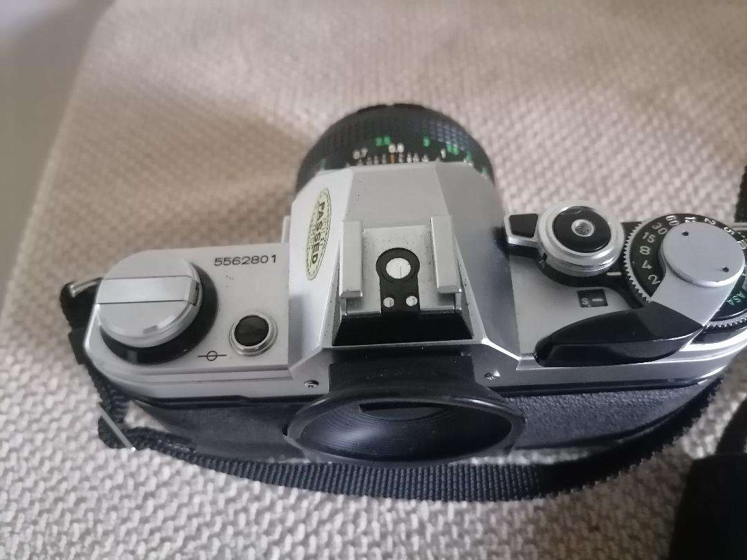 Vintage Canon AE-1 35mm SLR Camera with 50mm 1:1.8 Lens