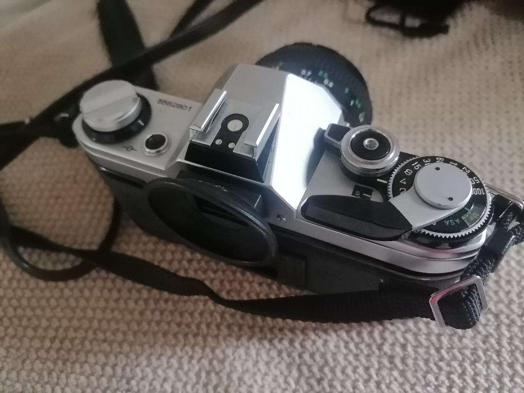 Vintage Canon AE-1 35mm SLR Camera with 50mm 1:1.8 Lens