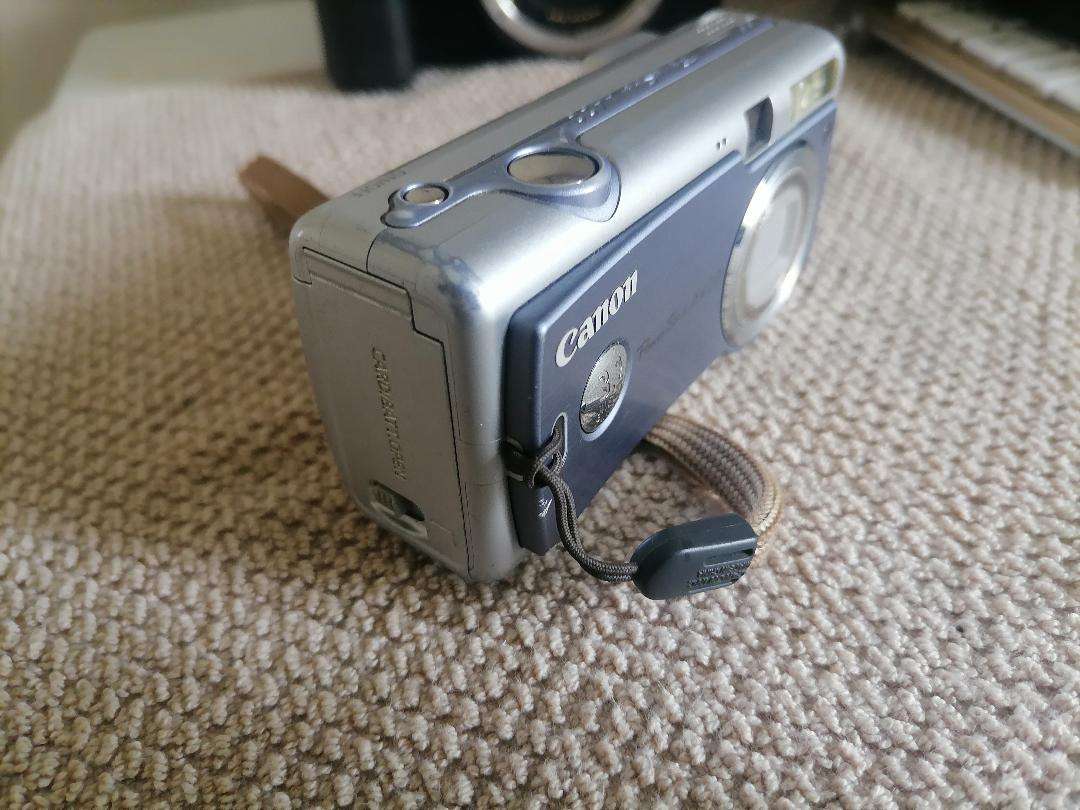 Lot of 2 x Canon cameras - one bid for both