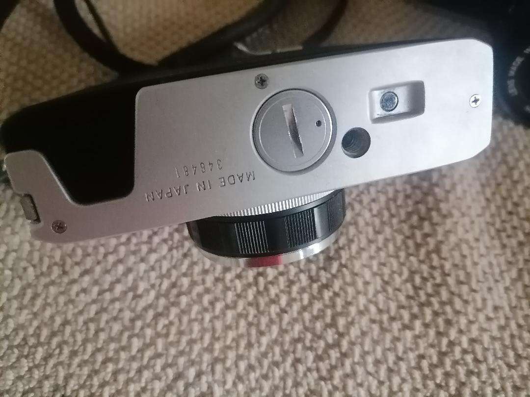 Vintage Canon AE-1 35mm SLR Camera with 50mm 1:1.8 Lens