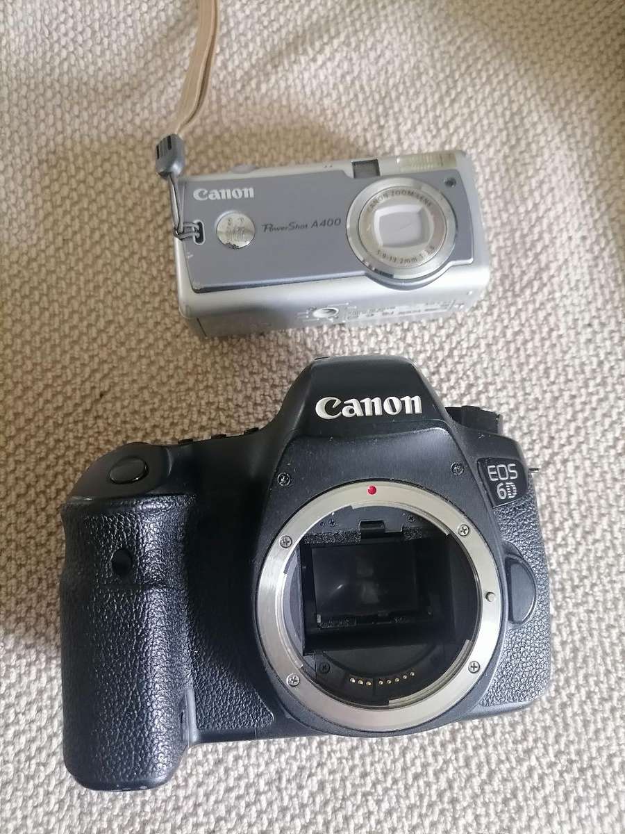 Lot of 2 x Canon cameras - one bid for both