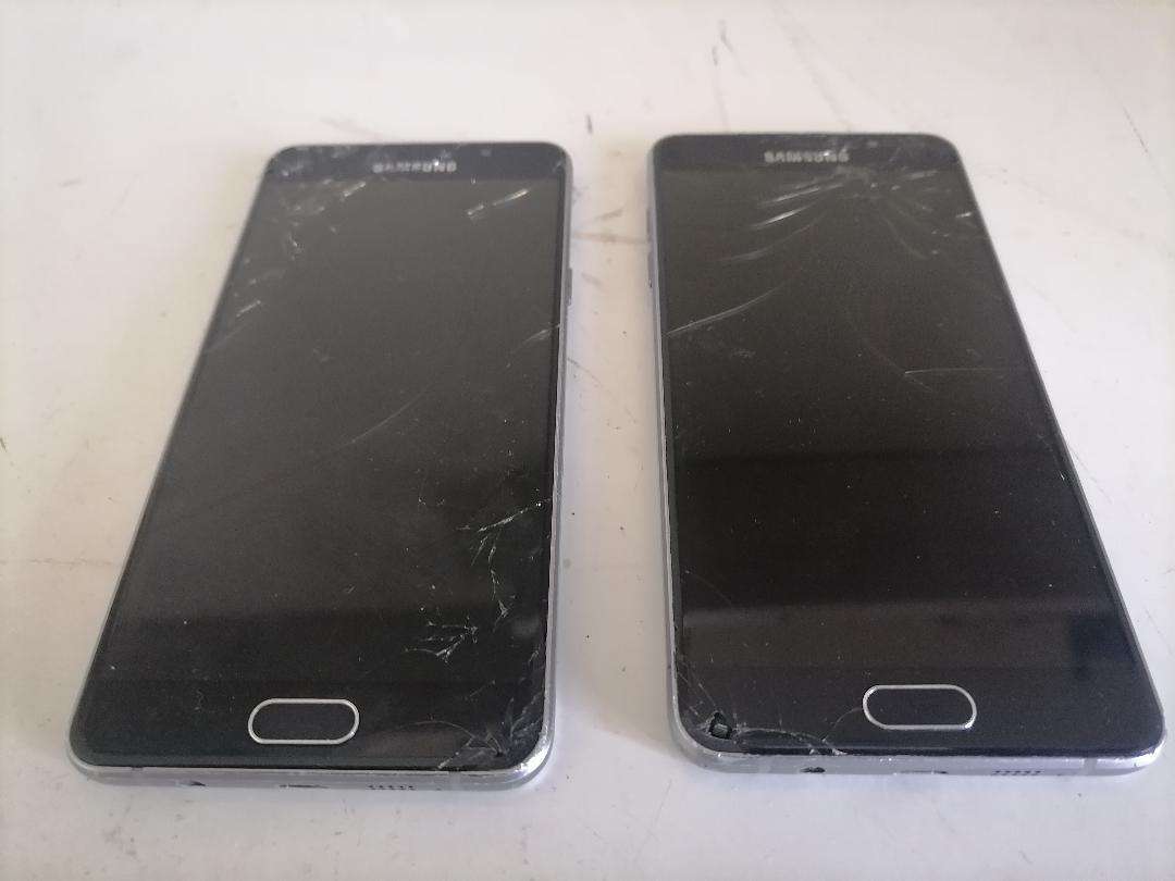 Lot of 2 x Defective Samsung A5 Cell Phones - One Bid for Both