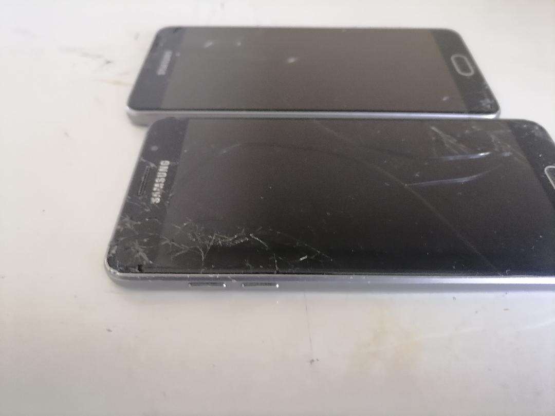 Lot of 2 x Defective Samsung A5 Cell Phones - One Bid for Both