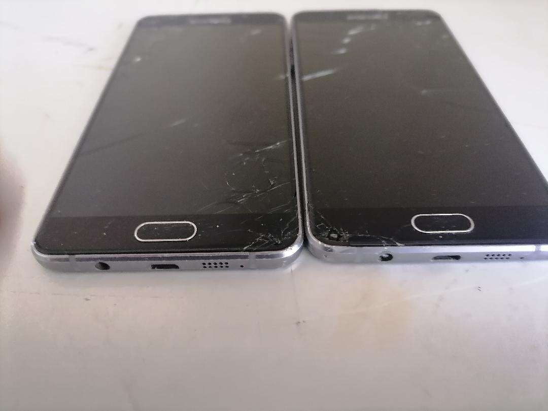 Lot of 2 x Defective Samsung A5 Cell Phones - One Bid for Both