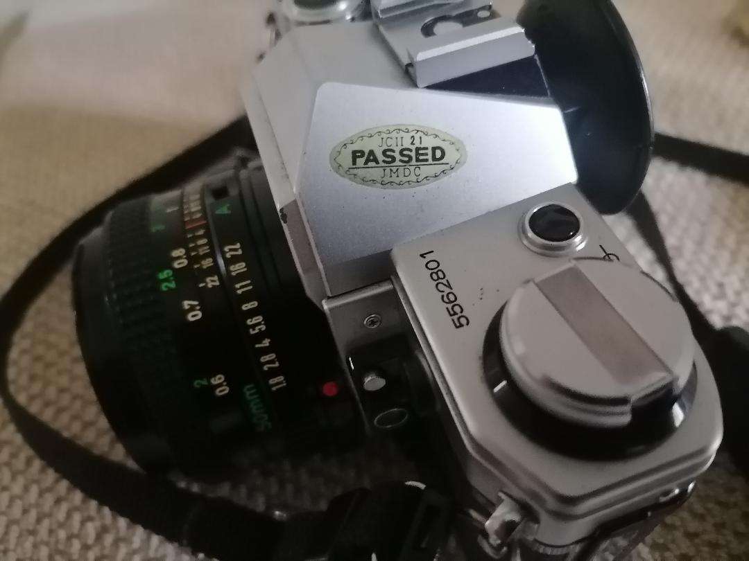 Vintage Canon AE-1 35mm SLR Camera with 50mm 1:1.8 Lens