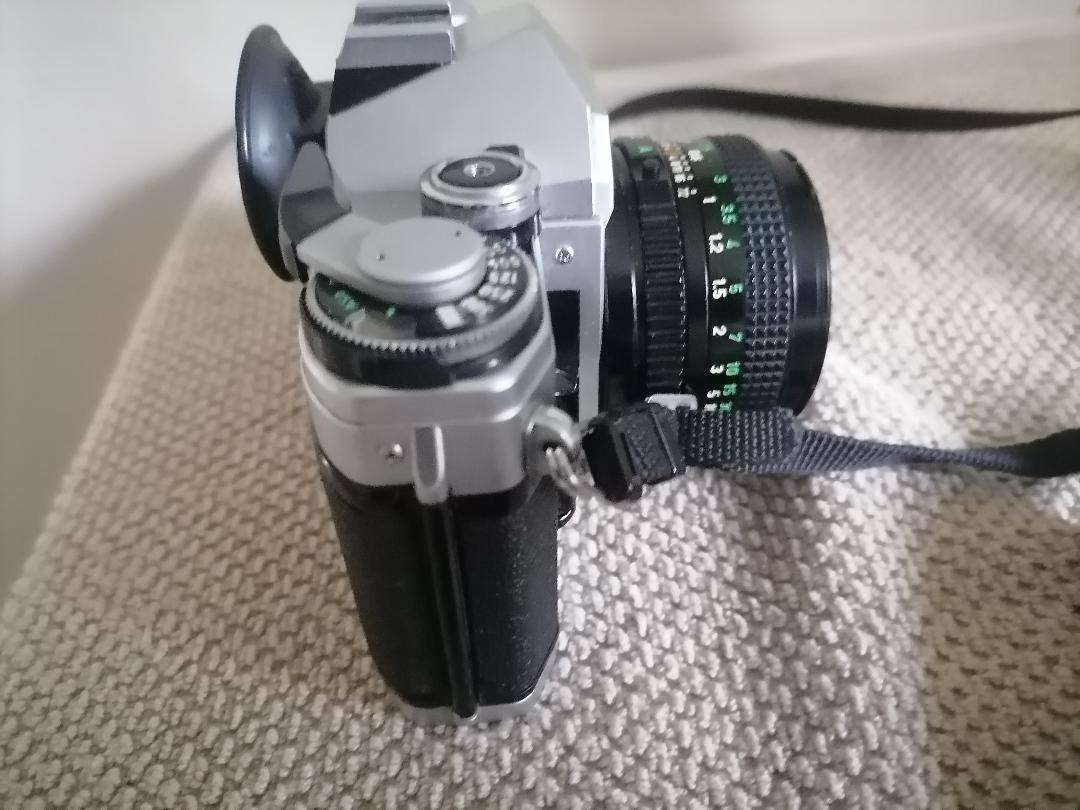 Vintage Canon AE-1 35mm SLR Camera with 50mm 1:1.8 Lens