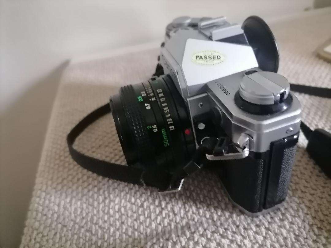 Vintage Canon AE-1 35mm SLR Camera with 50mm 1:1.8 Lens