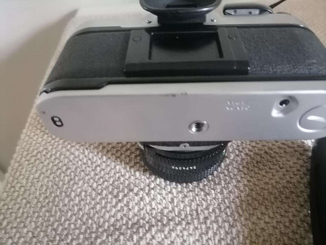 Vintage Canon AE-1 35mm SLR Camera with 50mm 1:1.8 Lens