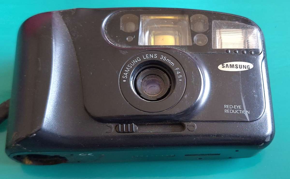 Samsung AF-333 35mm Auto Focus and Flash Camera No battery cover