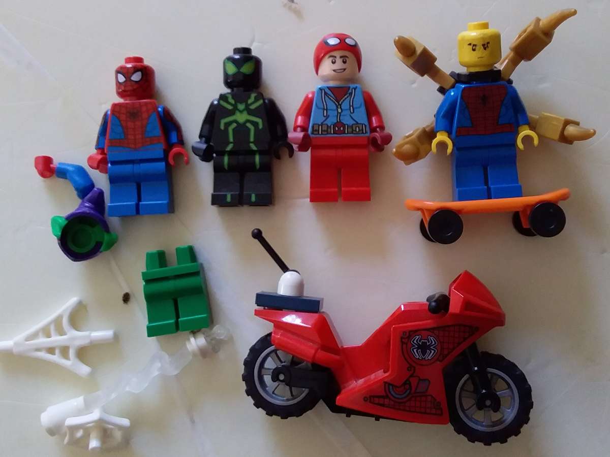 4 Lego Spiderman Minifigures with Accessories, Spider Lair Parts and extra bricks