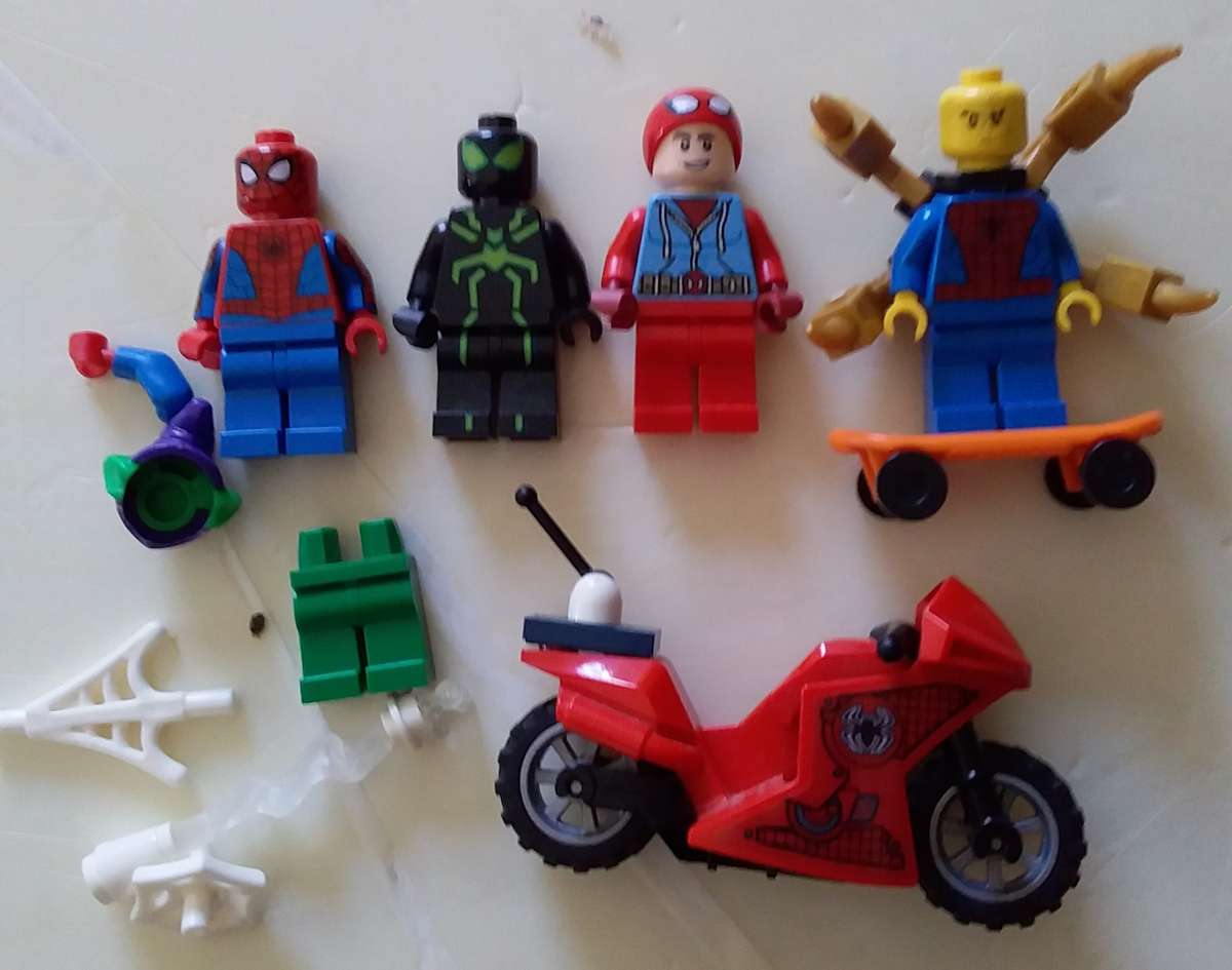 4 Lego Spiderman Minifigures with Accessories, Spider Lair Parts and extra bricks