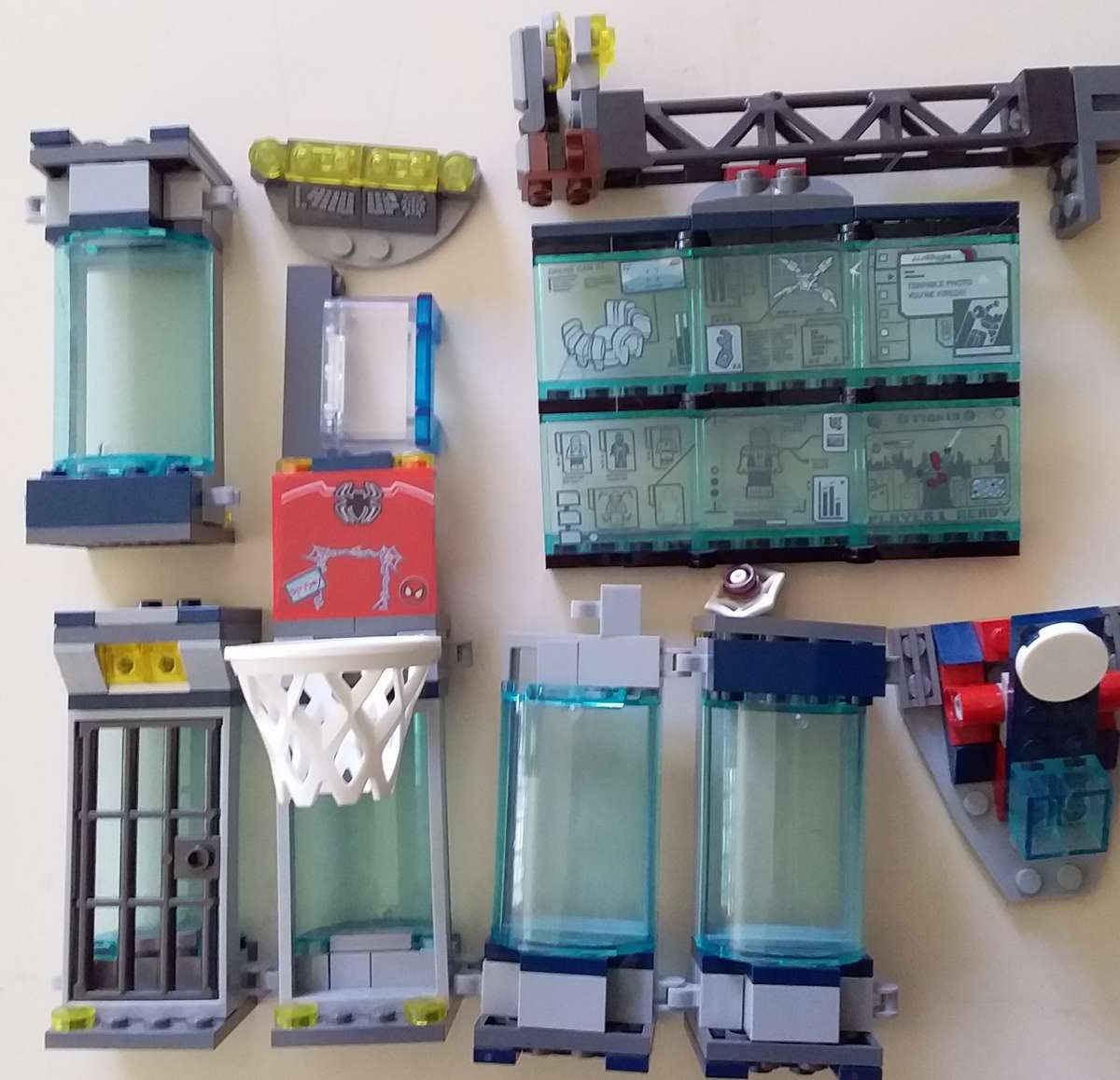 4 Lego Spiderman Minifigures with Accessories, Spider Lair Parts and extra bricks