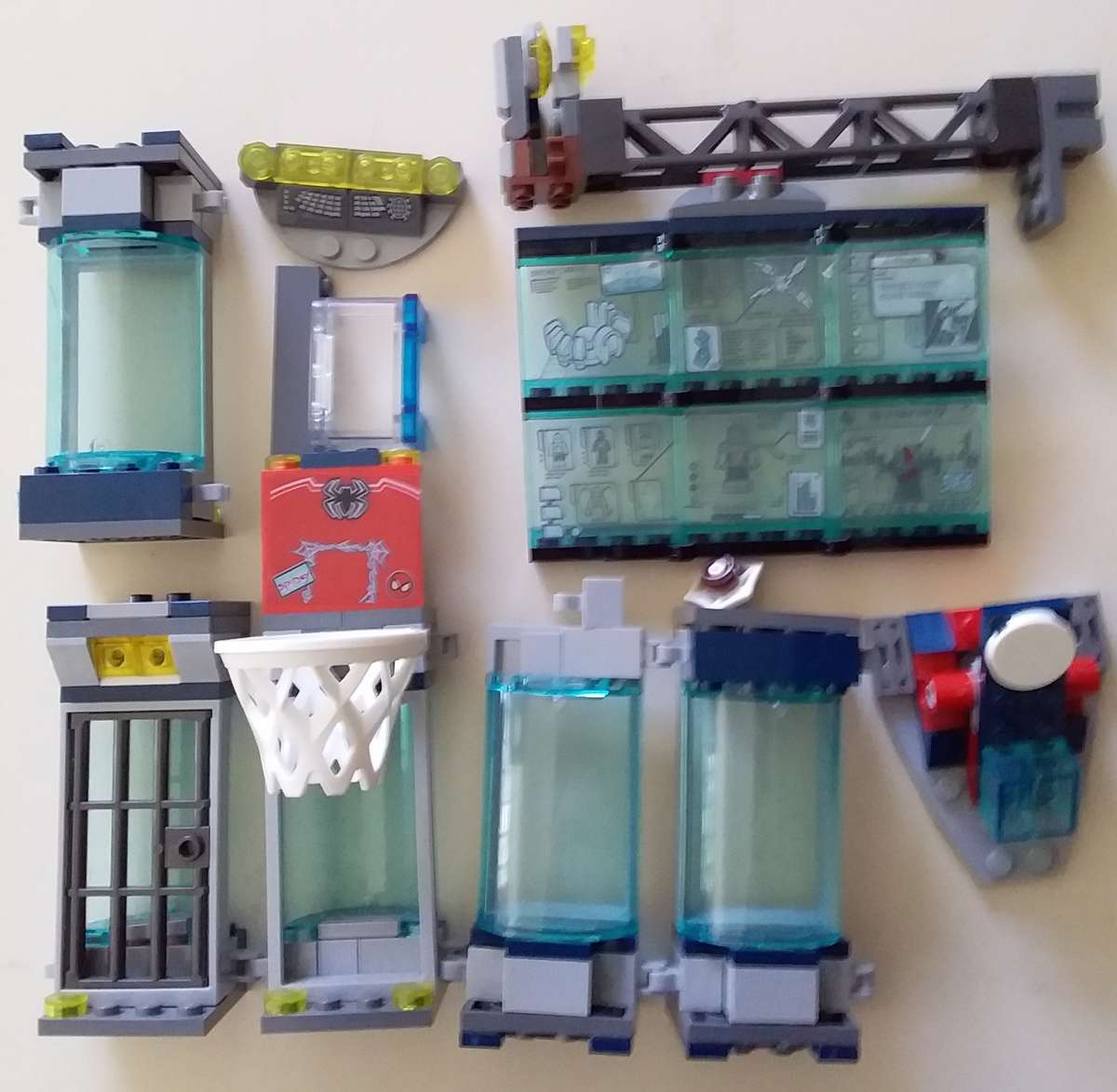 4 Lego Spiderman Minifigures with Accessories, Spider Lair Parts and extra bricks