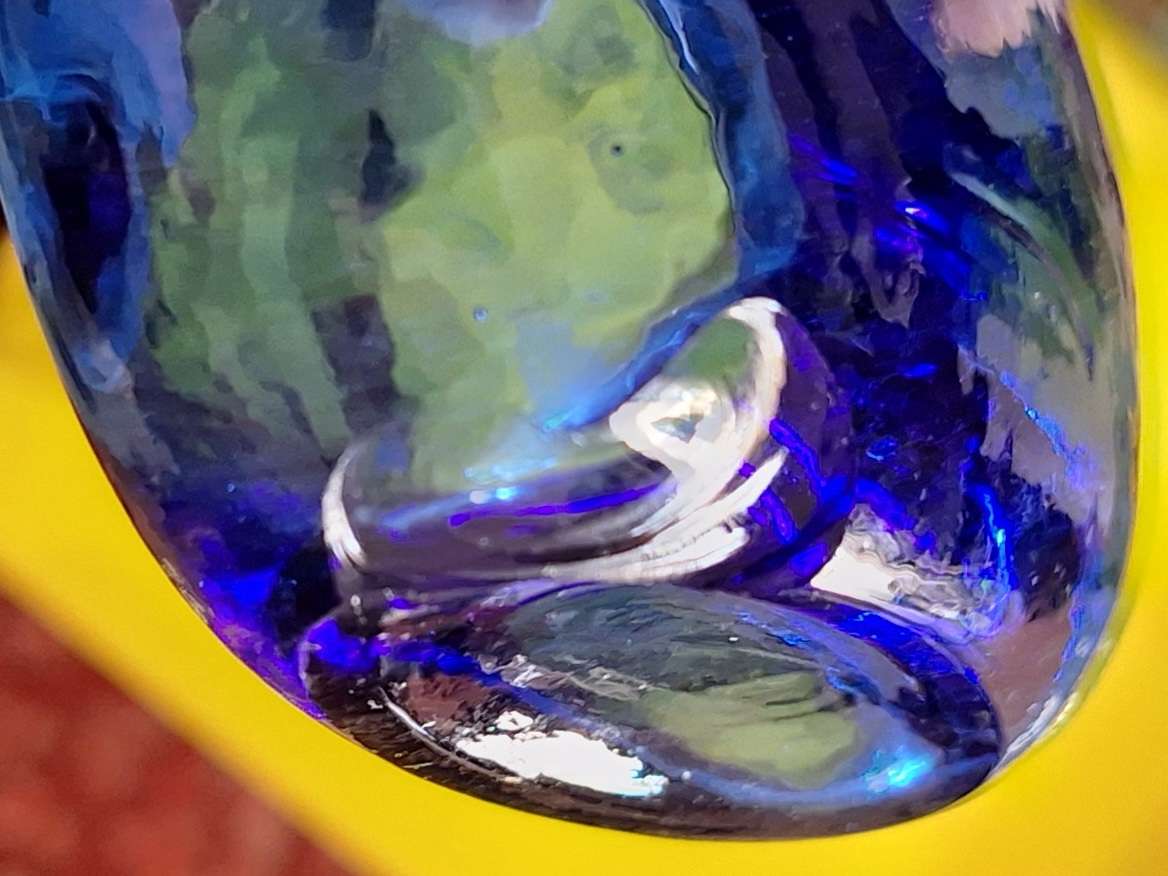 Small Blue Glass Bottle with Cork Stopper and Chip on Base