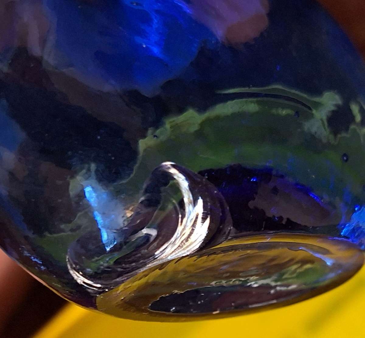 Small Blue Glass Bottle with Cork Stopper and Chip on Base