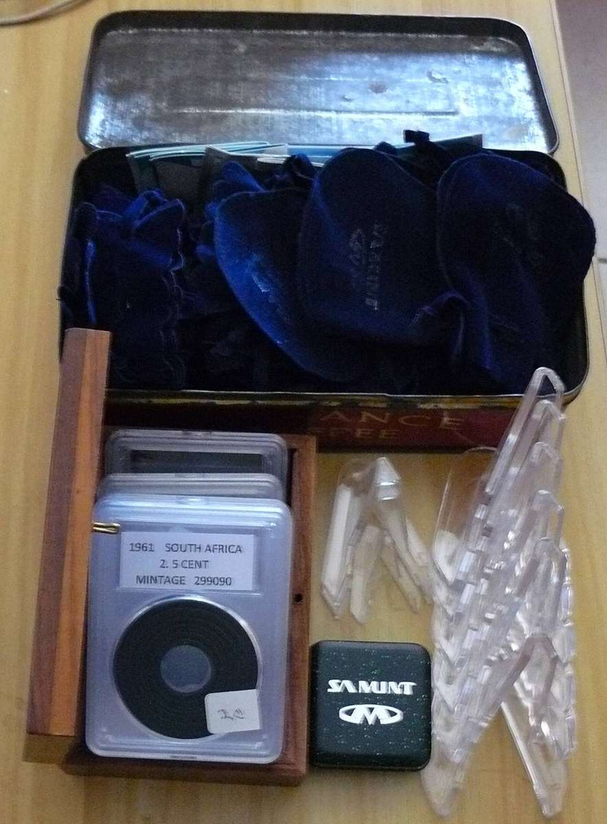 TIN WITH SAM BAGS AND OTHER COIN RELATED ITEMS ALL FOR ONE BID