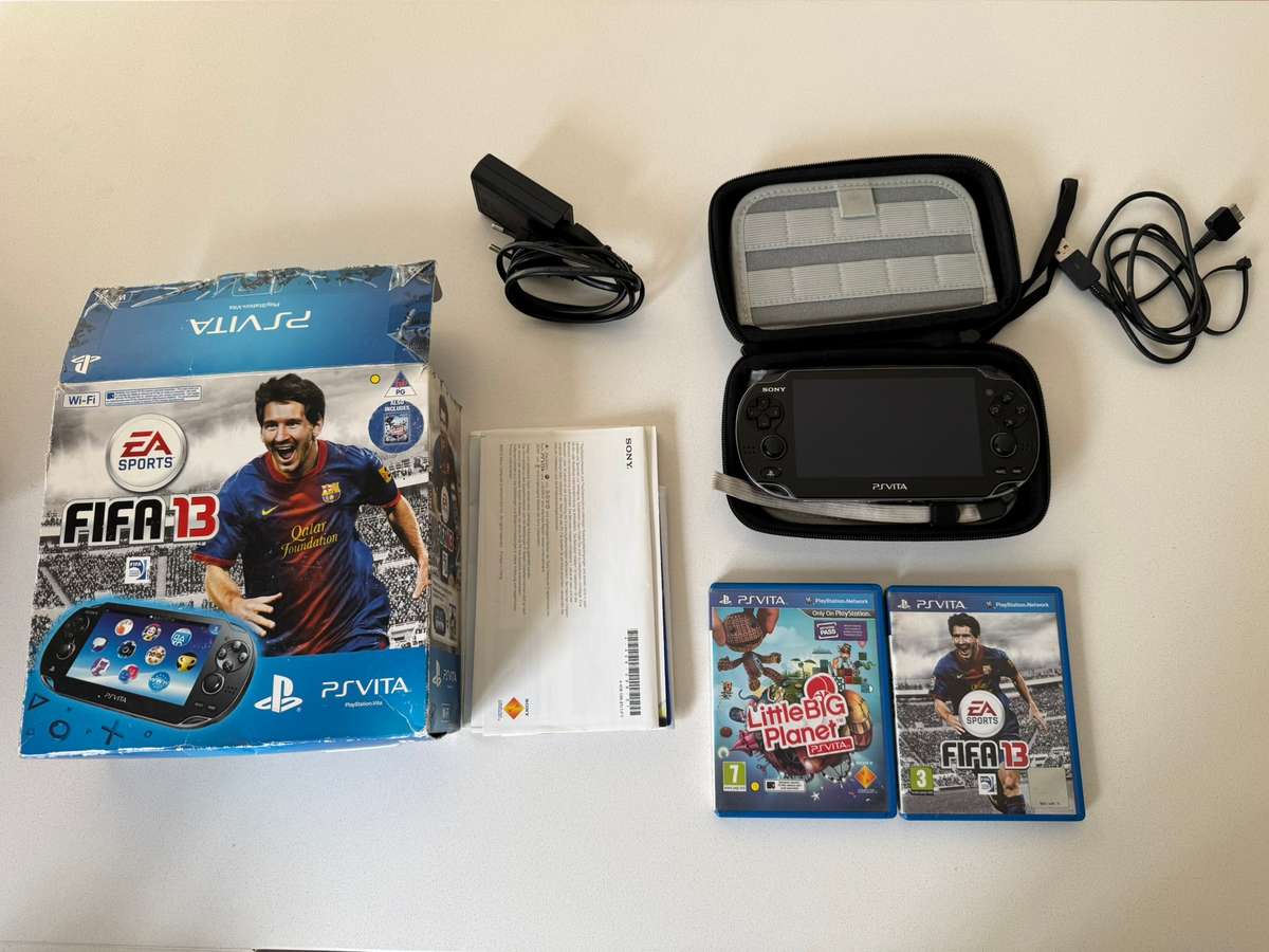 PS Vita OLED (CiB) + 2 Games