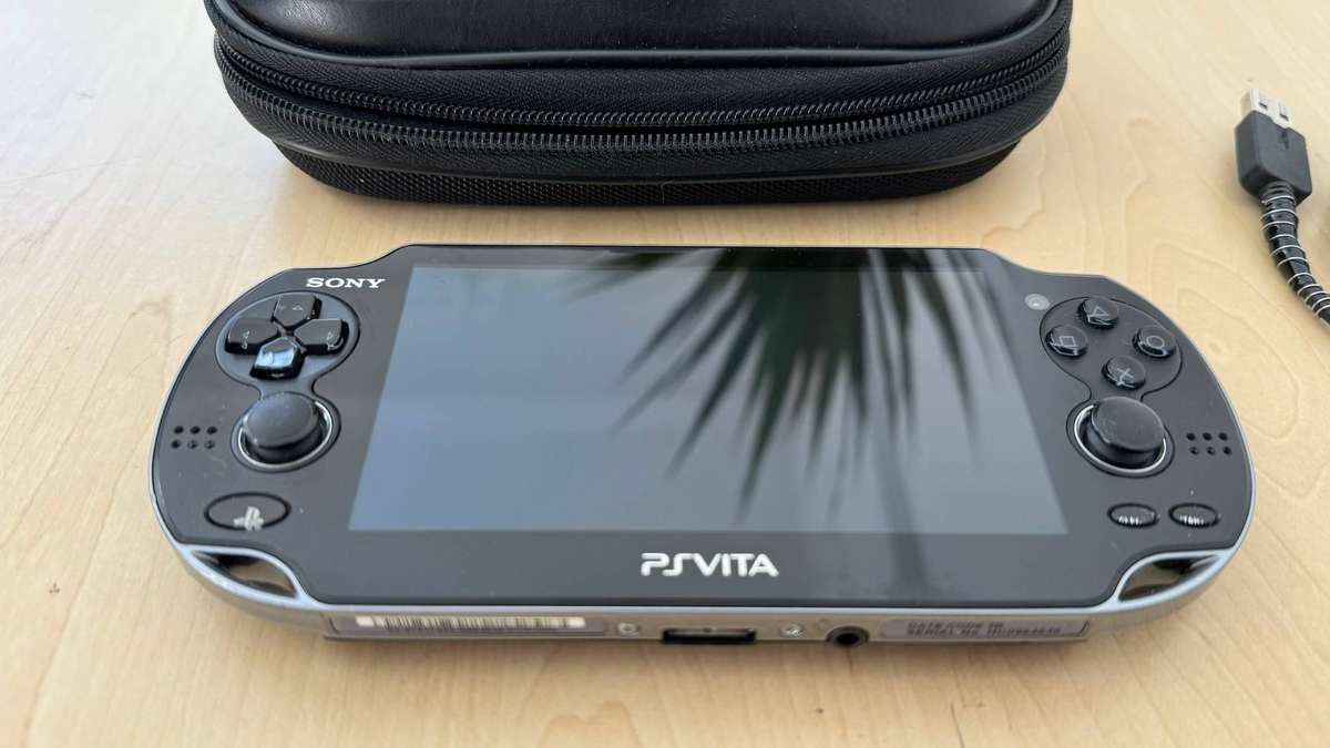 PS Vita OLED Console (Includes 64GB SD Card)