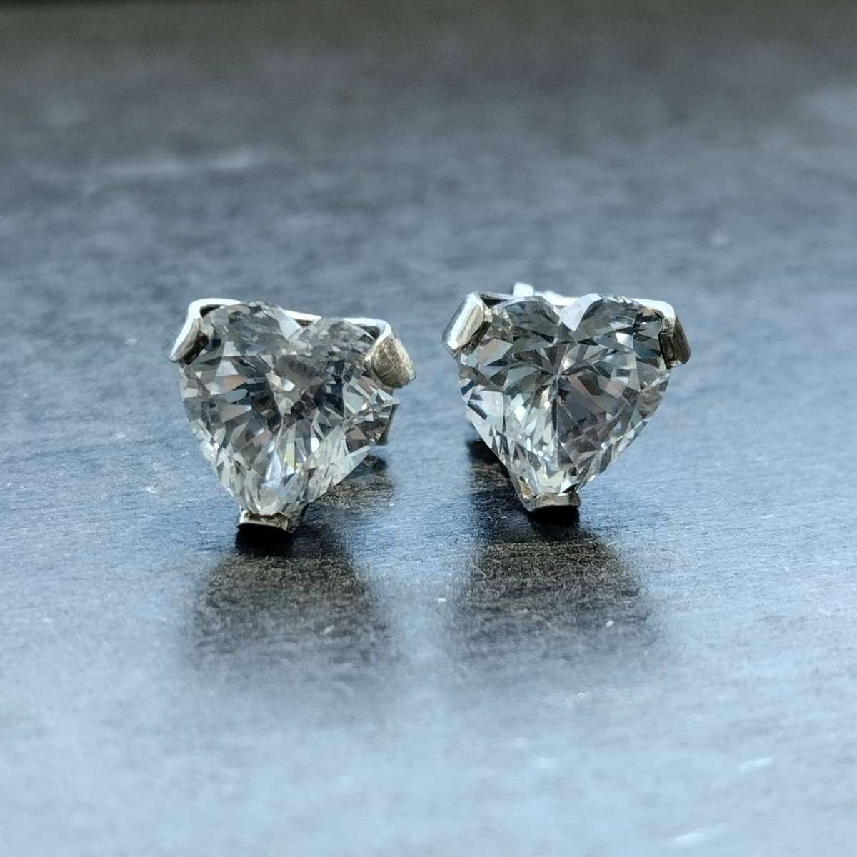 Heart-shaped sterling silver stud earrings