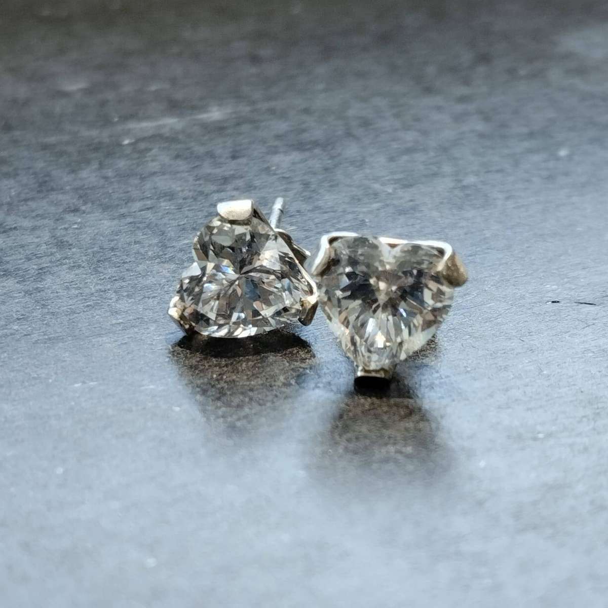 Heart-shaped sterling silver stud earrings