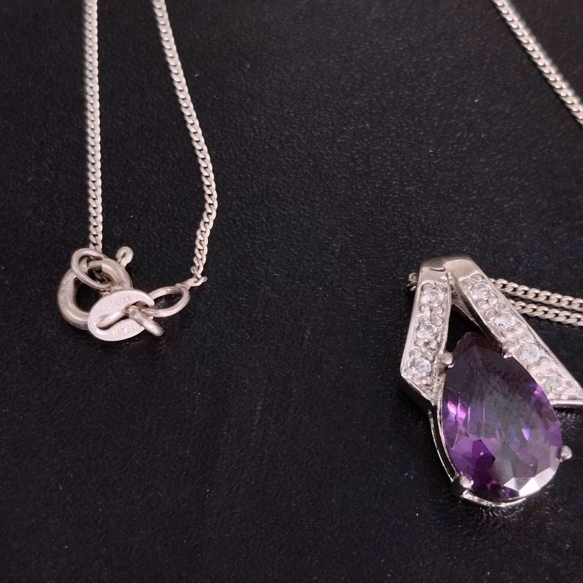 Sterling Silver Necklace featuring a pear-cut amethyst and cubic zirconia accents